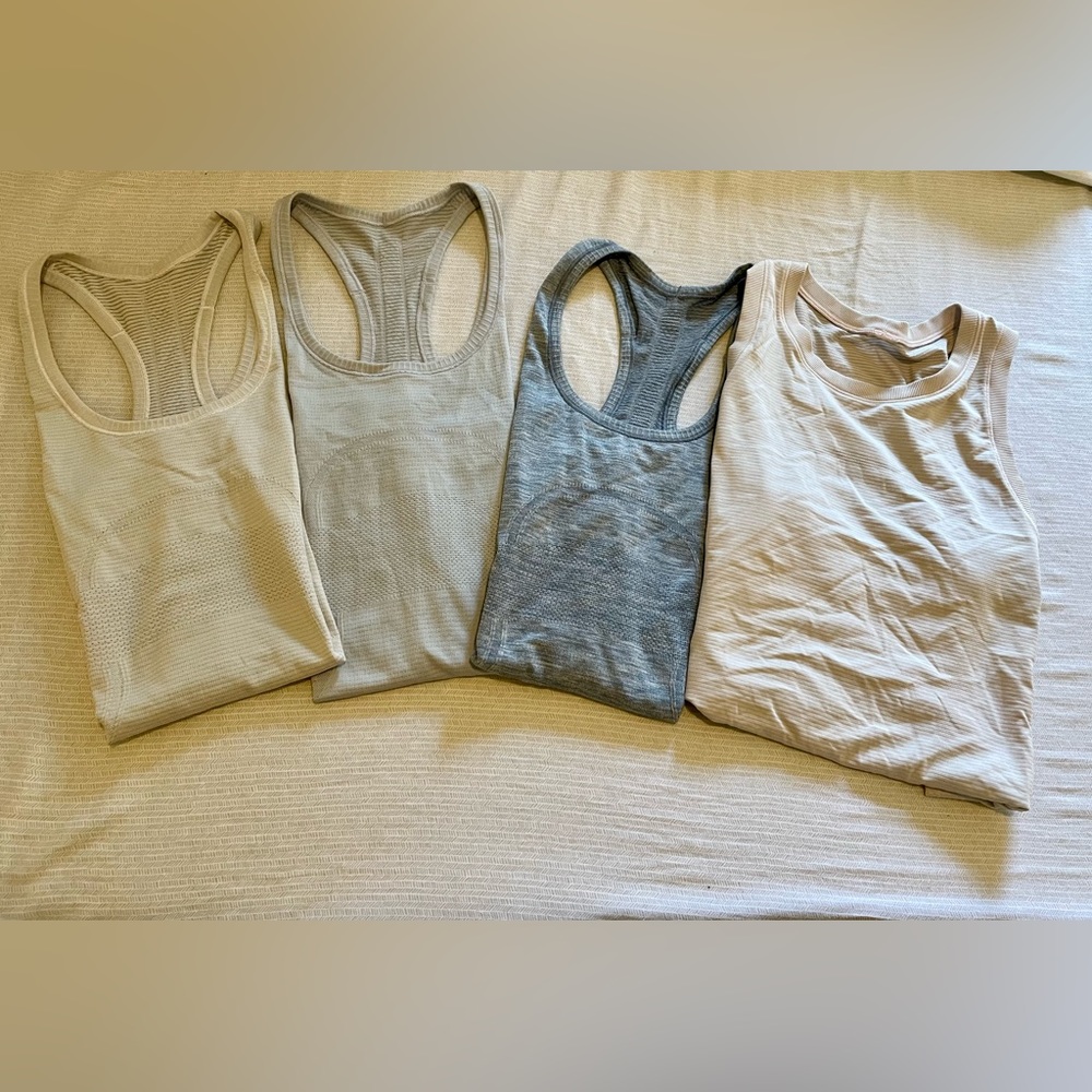 **LOT** 4 Lululemon Swiftly Tanks size 6